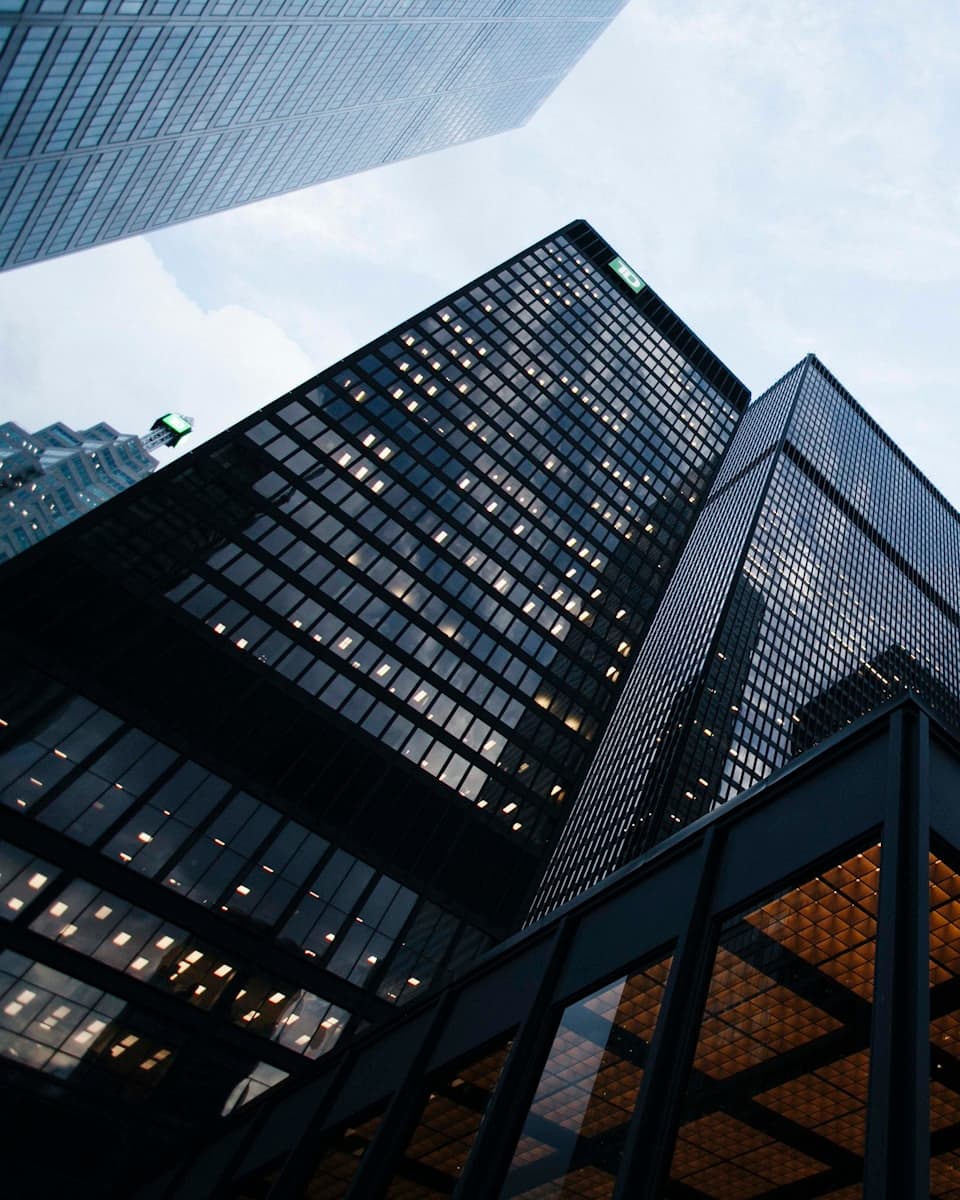 Glass office towers seen from street level